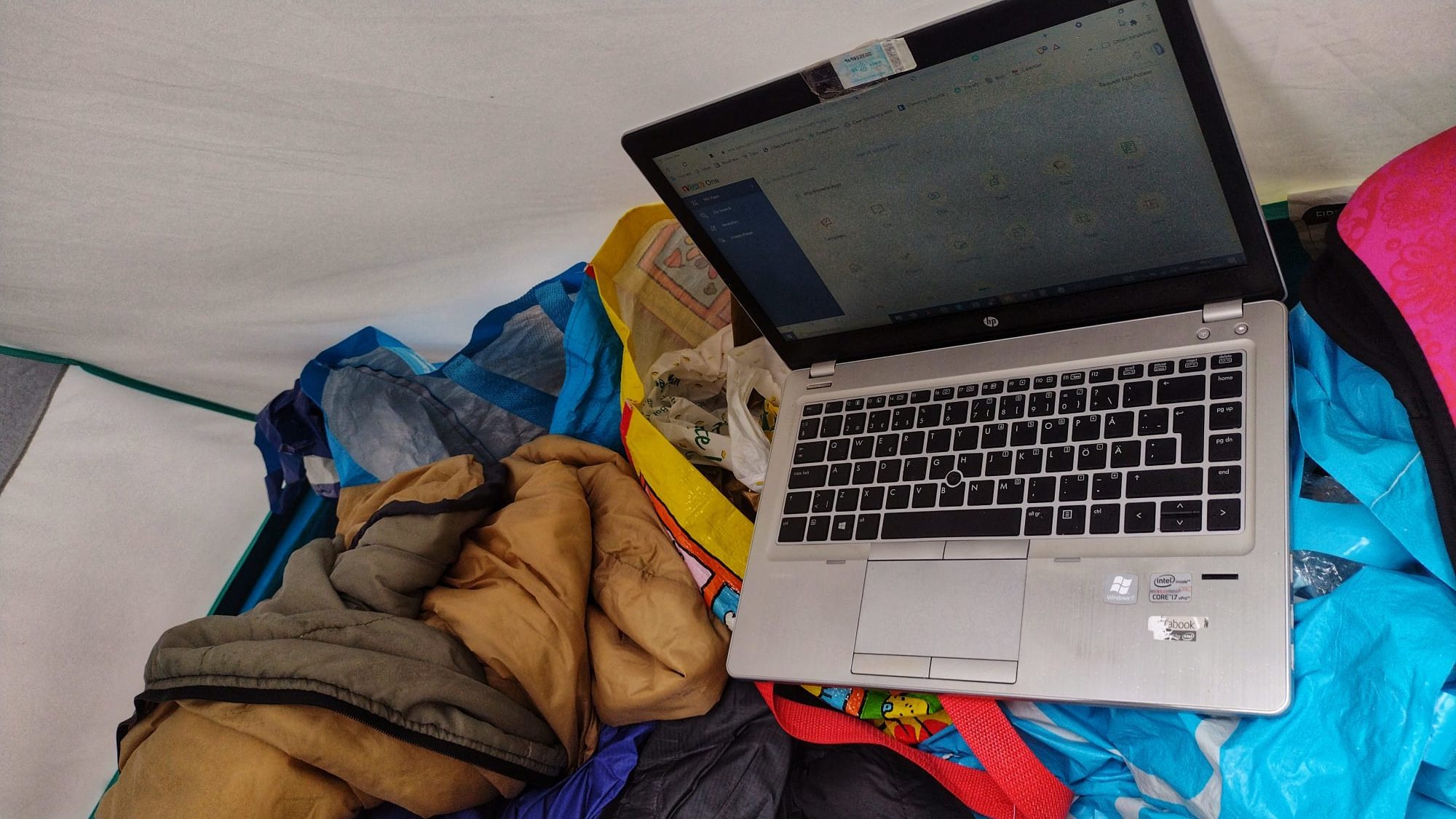 working remotely while bicycle touring - sometimes you have to do it from a tent