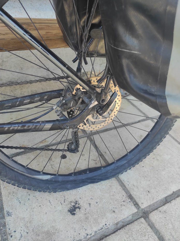 bike touring safety - fixing a flat tire is an essential skill