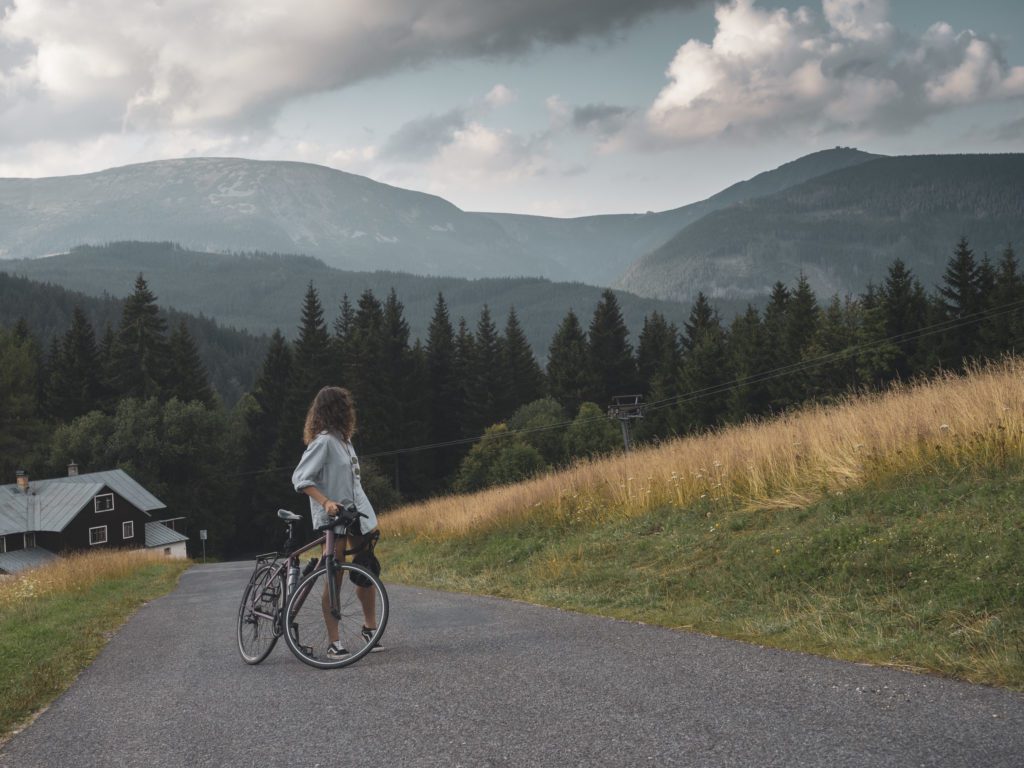 cycling in the giant mountains with the view over the snezka mountain